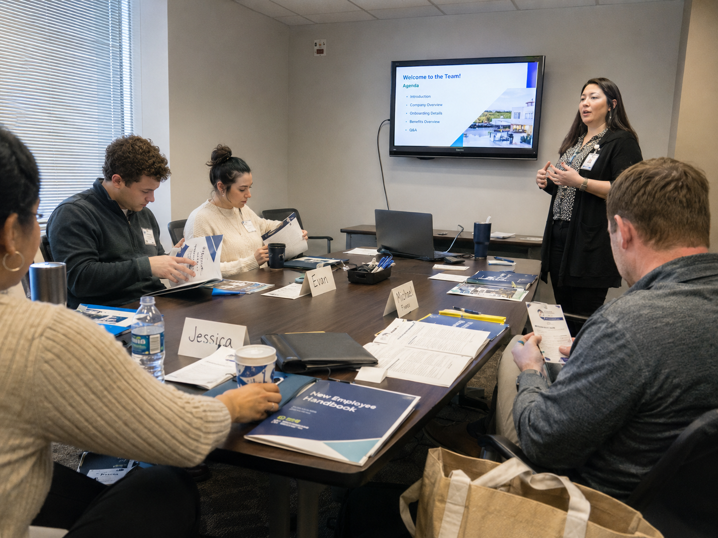 A workplace team reviewing work together